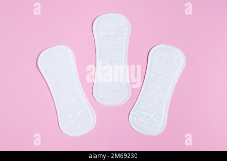 Daily women's gasket on pink background. Woman hygiene protection. Stock Photo