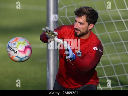 03 January 2023, Hessen, Frankfurt/Main: Goalkeeper Kevin Trapp catches the ball during Eintracht Frankfurt's training kick-off at the stadium. Photo: Arne Dedert/dpa Stock Photo