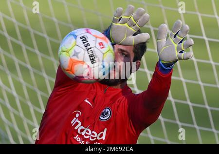 03 January 2023, Hessen, Frankfurt/Main: Goalkeeper Kevin Trapp catches the ball during Eintracht Frankfurt's training kick-off at the stadium. Photo: Arne Dedert/dpa Stock Photo