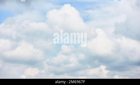 White heap clouds in the sky - background, cloudscape Stock Photo