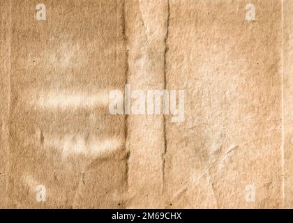 Old collapsing paper with cracks and scratches Stock Photo