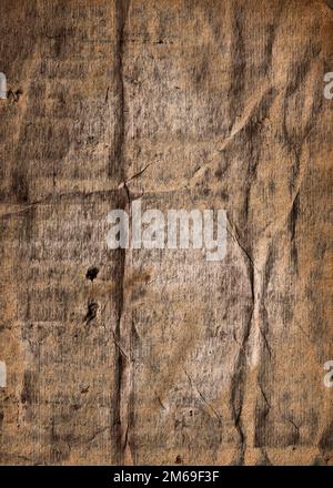 Old collapsing paper with cracks and scratches Stock Photo