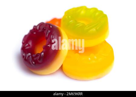 Multicolored jelly candy donuts on a white background. Stock Photo
