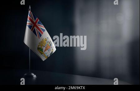 Small national flag of the British Antarctic Territory on a black background. Stock Photo