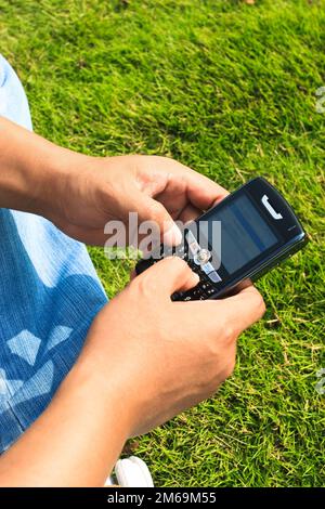 Man using cellphone Stock Photo