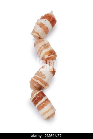 Studio shot of traditional pigs in blankets cut out against a white background - John Gollop Stock Photo