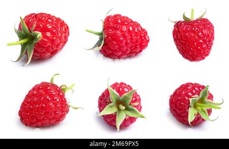 Raspberry isolated. Raspberries with leaf isolate. Raspberry with leaf isolated on white. Side view raspberries set. Stock Photo