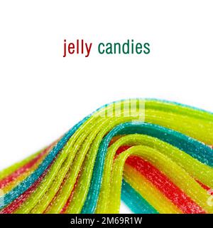 Colorful jelly candies strips in sugar sprinkles. Sour flavored rainbow  candy background Stock Photo by esindeniz