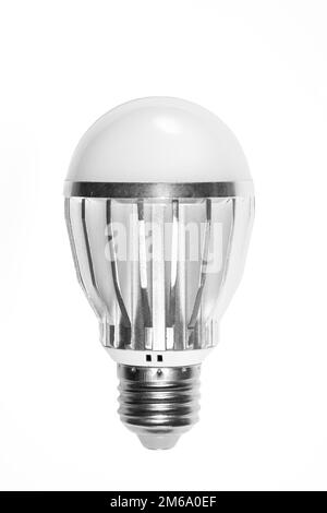 LED energy-saving lamp with aluminum radiator and E27 screw cap base isolated on white background Stock Photo