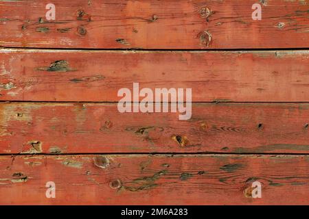 Old painted wooden boards wagon side as background Stock Photo