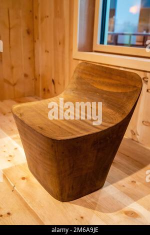 Close up of handmade stool from 2011 made from ziricote Stock Photo