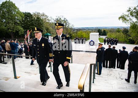 Maj. Gen. Allan M. Pepin (right), commanding general, Joint Task Force -National Capital Region, and Thomas Manger (left), chief of police, U.S. Capitol Police, participate in an Army Full Honors Wreath-Laying Ceremony at the Tomb of the Unknown Soldier at Arlington National Cemetery, Arlington, Va., April 21, 2022. Stock Photo