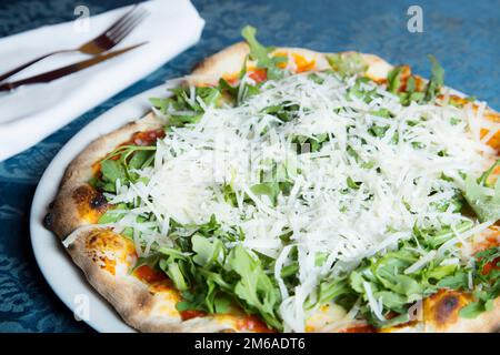 Pizza with vegetables. Neapolitan pizza made with baked vegetables. Italian vegetarian recipe. Stock Photo