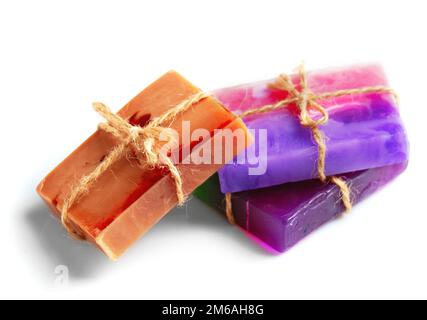 Pieces of natural soap with herbs and flowers. Stock Photo