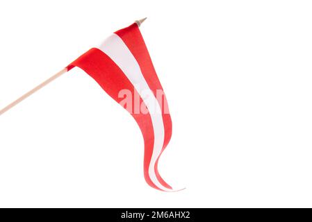 The Latvian flag on a white background is developing and flying in the wind Stock Photo