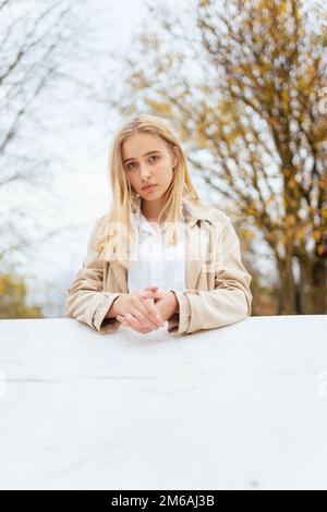 portrait of a young woman in autumn Stock Photo