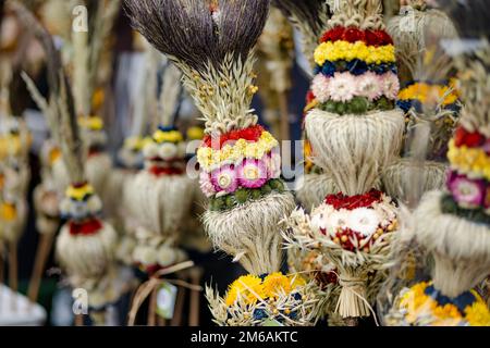 Traditional Lithuanian Easter palms known as verbos sold on Kaziukas, Easter market in Vilnius. Lithuanian capitals annual traditional crafts fair is Stock Photo