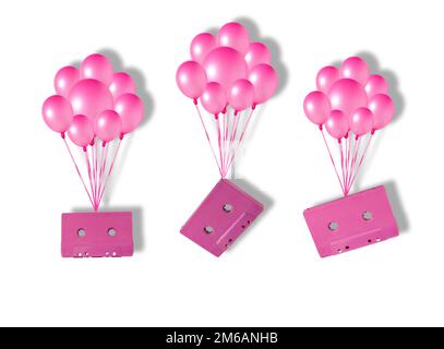 three music retro cassettes flying with balloons, creative art design Stock Photo