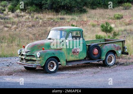 Green Chevrolet truck, pick-up, classic car parked on the side of the road, Zion National Park, Utah, USA Stock Photo