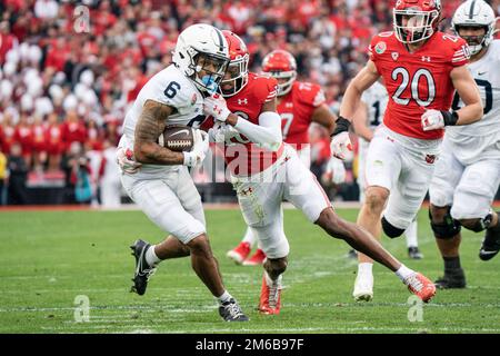 Penn State Nittany Lions wide receiver Harrison Wallace III (6) is tackled by Utah Utes cornerback Zemaiah Vaughn (16) during the 109th Rose Bowl foot Stock Photo