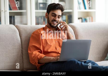 Young middle eastern businessman working from home Stock Photo