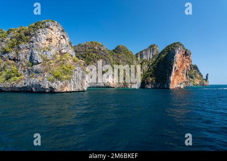 Approaching Monkey Island in the small cove on Koh Phi Phi Don in Thailand Stock Photo