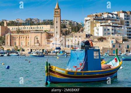 Traditional Maltese fishing boat, Marsaskala bay, Malta Stock Photo
