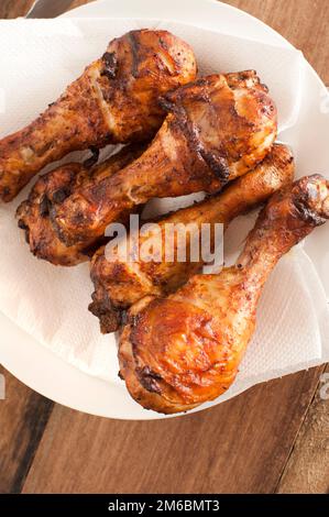 Close up on four roasted drumsticks Stock Photo