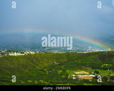 Rainbow over Diamond Head Crater near Waikiki on the island of Oahu, Hawaii Stock Photo