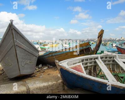 Weathered Colorful Boats on the Coast in Alexandria Egypt Stock Photo