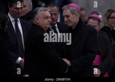 Vatican City, Vatican, 3 January 2023. Hungarian Prime Minister greets Archbishop Georg Gaenswein upon his arrival to pay homage to the late Pope Emeritus Benedict XVI in St. Peter's Basilica at the Vatican. Maria Grazia Picciarella/Alamy Live News Stock Photo