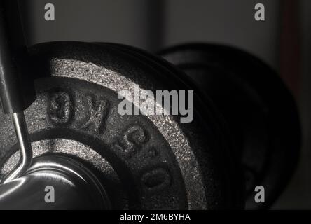 Dumbbell collapsible close-up on black background Stock Photo