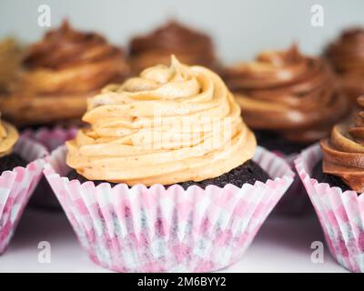 Chocolate cupcake with mixed frosting cream Stock Photo