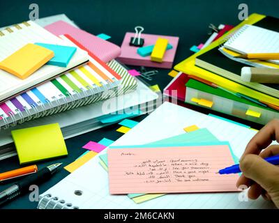 Learning New Language Writing Words Many Times on the Notebook; Arabic Stock Photo