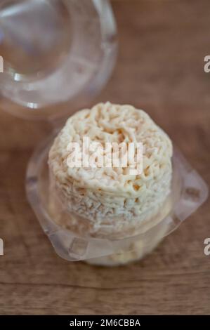 Cheese collection, French soft Chabichou of Poitou cheese made from goat milk in region Nouvelle-Aquitaine, France close up Stock Photo