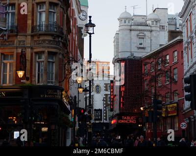 The Windmill nightclub on Great Windmill Street in Soho on a winters evening with street lights illuminated., London, England Stock Photo