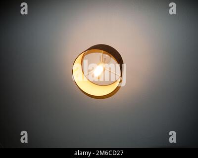 Bedroom ceiling light turned on electricity white bright Stock Photo