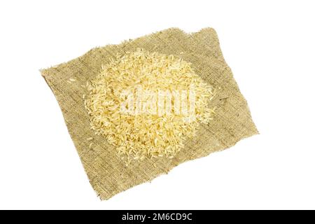 A handful of rice cereal lies on a napkin on a white background Stock Photo