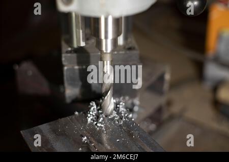 Metal drilling. Large drill bits steel. Production details. Stock Photo