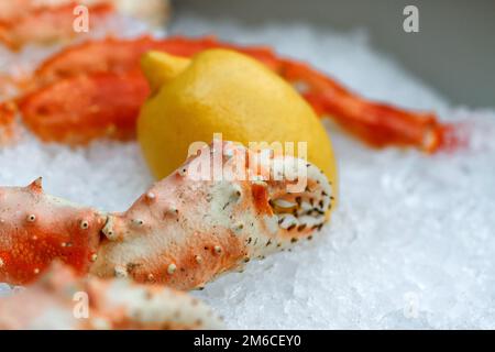 Crab claws in a box Stock Photo