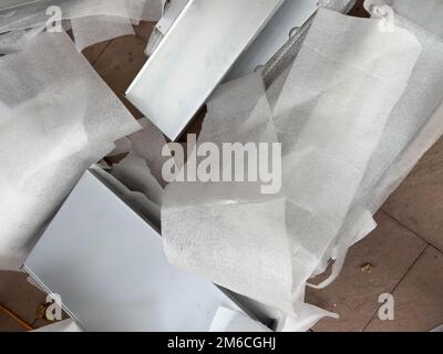 Paris, France - Nov 11, 2022: Vitsoe shelves on protection plastic wraps during relocation Stock Photo
