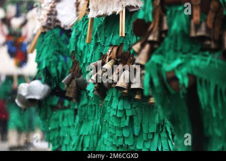 Traditional Kukeri costume bells on a traditional Bulgarian Kukeri holidays festival Stock Photo