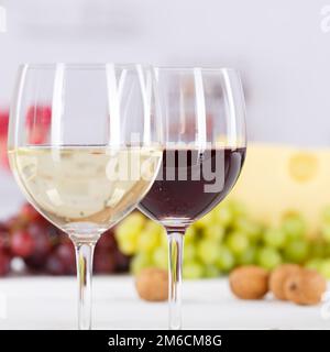 Wine glasses wine glasses white wine red wine white wine grapes square Stock Photo