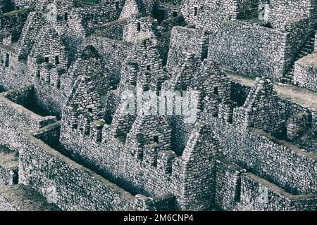 Stone ancient ruins of a city on the Inca Trail, Peru. Stock Photo