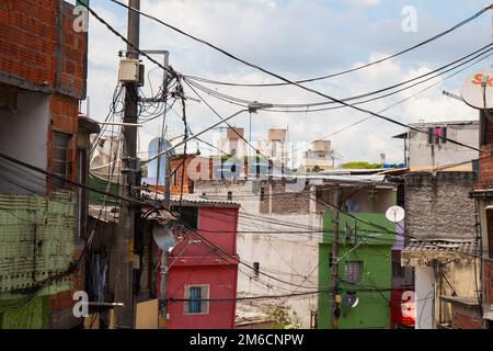 Colourful worn houses of a slum in Brazil. Stock Photo