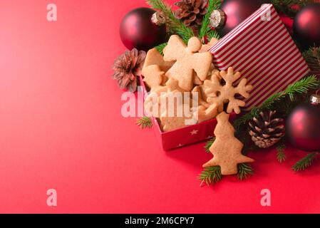Christmas ginger cookies and red balls Stock Photo