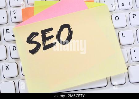 SEO Search Engine Optimization search engine optimization computer internet business concept notepad Stock Photo