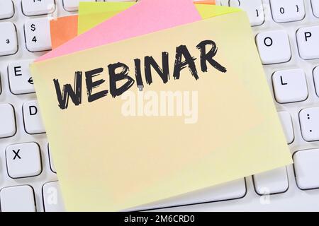 Webinar online training internet seminar course workshop learn education business concept notepad Stock Photo