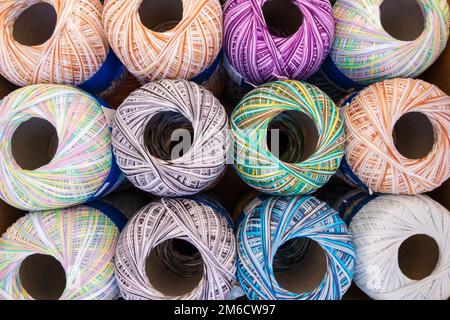 Colorful spools of thread reels. Stock Photo