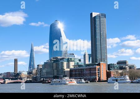 View across river Thames from Victoria Embankment of London skyline with skyscrapers - The Shard, One Blackfriars and South Bank Tower, England, UK Stock Photo